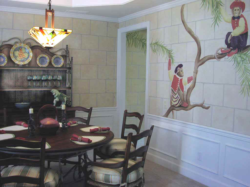 Faux finished walls include monkeys from drapery fabric